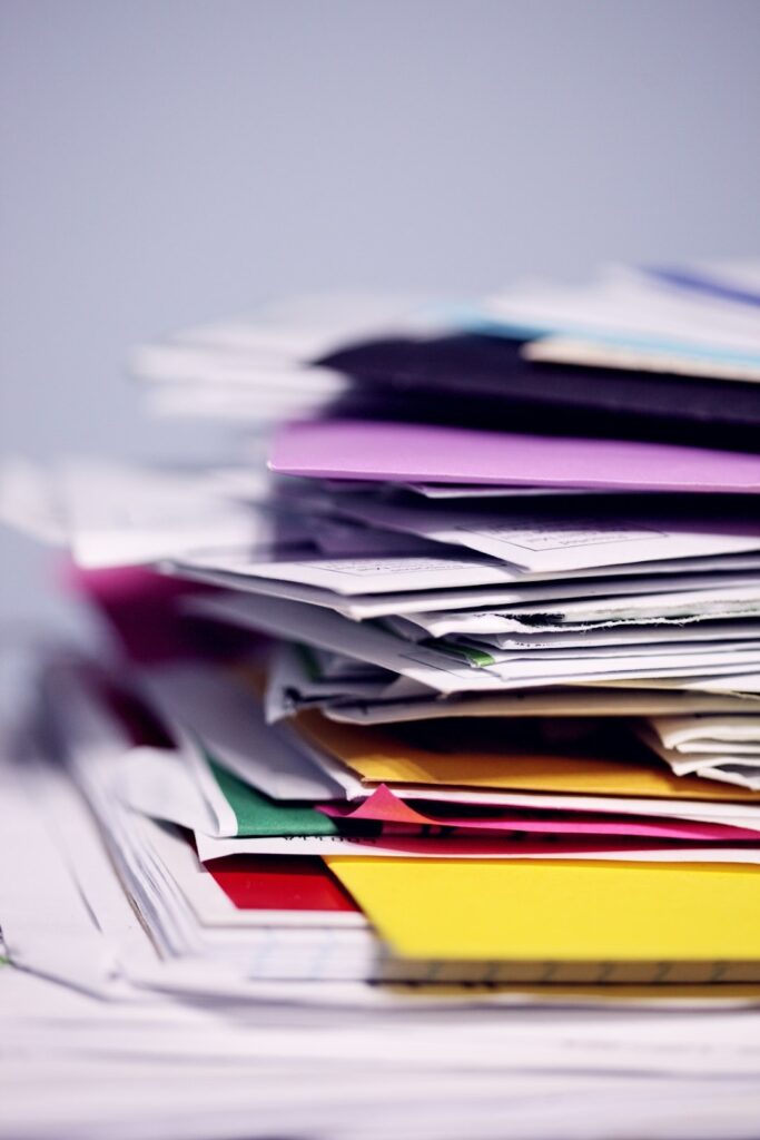 pile of multicoloured work papers